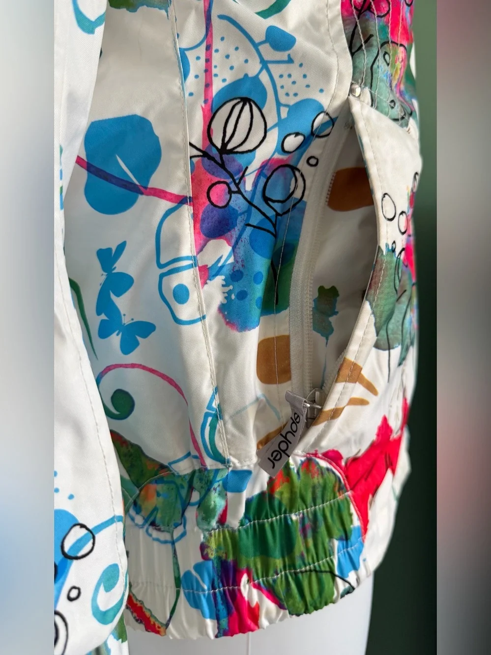 Spyder Women's White Ski Jacket with Multicolor Abstract Art Print